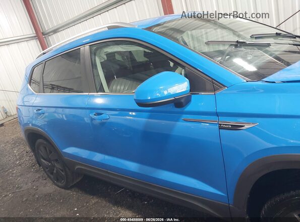 3VVVX7B28RM039455 2024 VOLKSWAGEN TAOS Blue Вид задньої частини салону