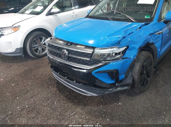 3VVVX7B28RM039455 2024 VOLKSWAGEN TAOS Blue Вид спереду