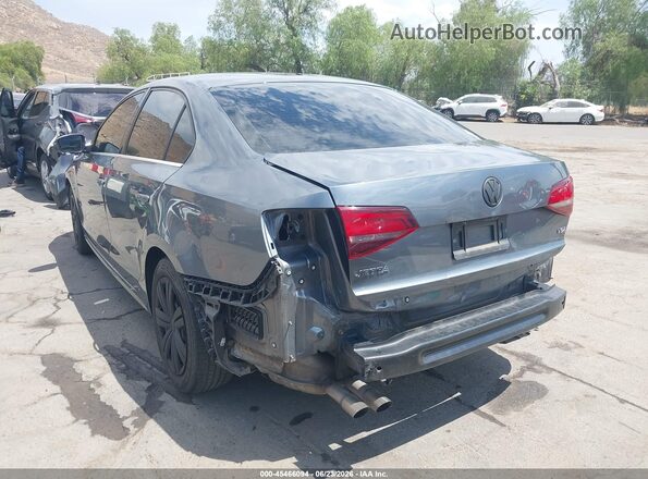 3VW2B7AJ4HM392666 2017 VOLKSWAGEN JETTA Gray Trasero izquierdo