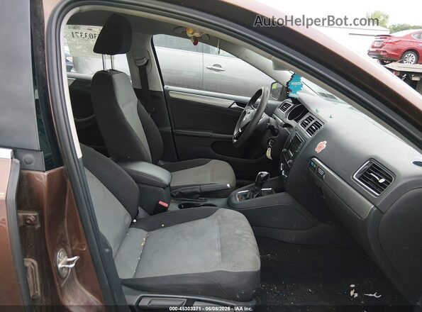 3VW2B7AJXHM352785 2017 VOLKSWAGEN JETTA Brown Front interior view