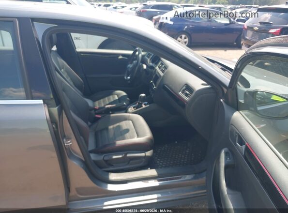 3VW4T7AJ9JM229507 2018 VOLKSWAGEN JETTA Gray Front interior view