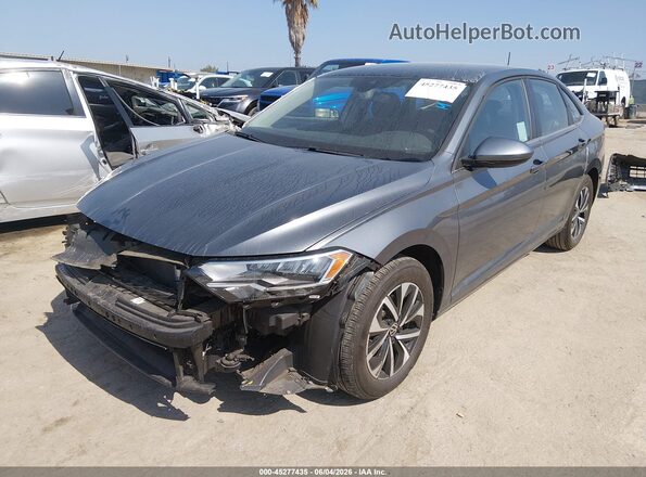 3VW5M7BU0RM075307 2024 VOLKSWAGEN JETTA Gray Vista tres cuartos delantera izquierda