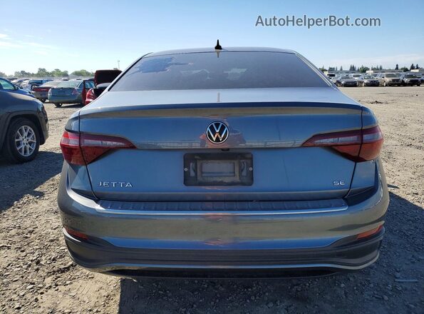 3VW7M7BU2PM038636 2023 VOLKSWAGEN JETTA Серый Вид сзади