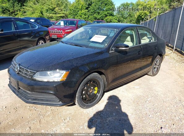 3VWB67AJ0JM211346 2018 VOLKSWAGEN JETTA Black Передня ліва чверть