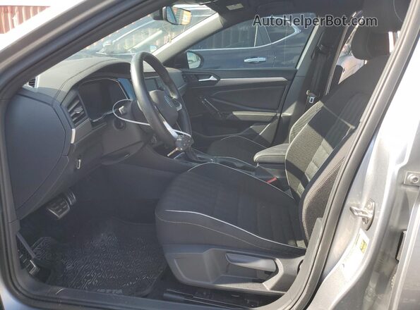 3VWBM7BU2PM012385 2023 VOLKSWAGEN JETTA Silver Front interior view