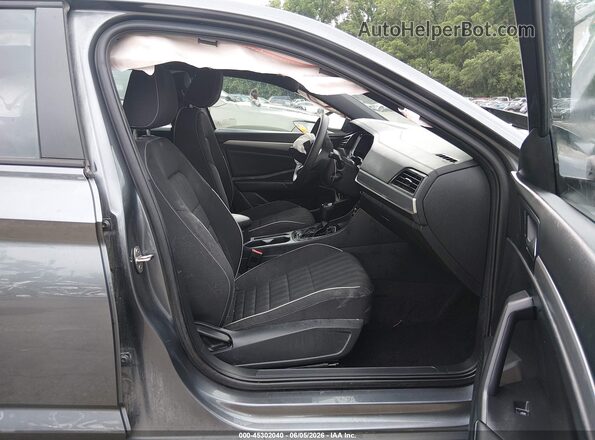 3VWBM7BU9PM034674 2023 VOLKSWAGEN JETTA Серый Вид салона спереди