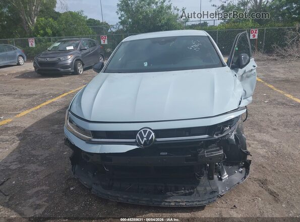 3VWBW7BU2TM044614 2026 VOLKSWAGEN JETTA Blue Rear interior view