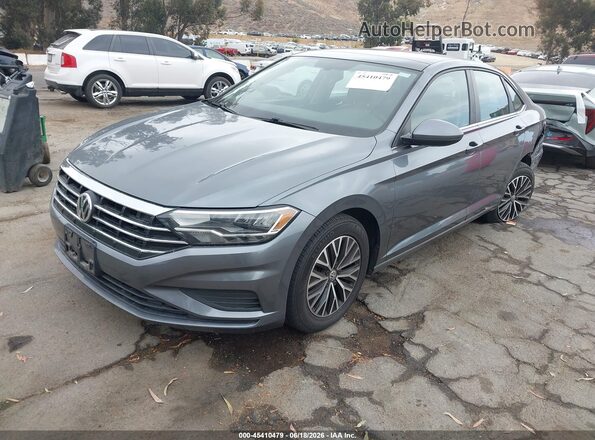 3VWC57BU3MM003711 2021 VOLKSWAGEN JETTA Gray Vista tres cuartos delantera izquierda