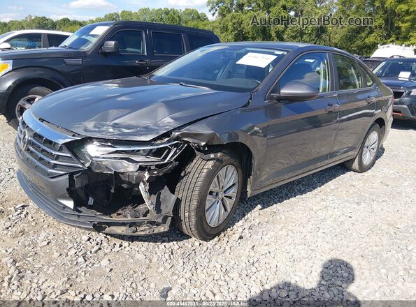3VWC57BU9KM200413 2019 VOLKSWAGEN JETTA Gray Vista tres cuartos delantera izquierda