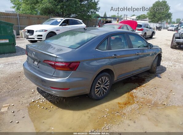 3VWC57BUXKM018591 2019 VOLKSWAGEN JETTA Blue Trasero derecho