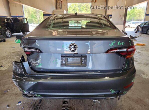 3VWC57BUXKM090827 2019 VOLKSWAGEN JETTA Gray Вид ззаду