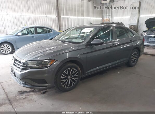 3VWC57BUXMM027763 2021 VOLKSWAGEN JETTA Blue Vista tres cuartos delantera izquierda