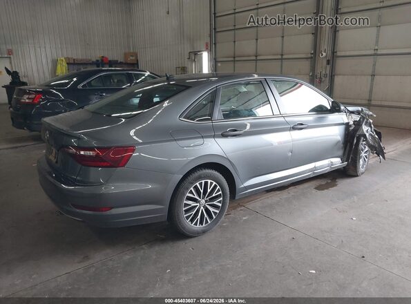 3VWC57BUXMM027763 2021 VOLKSWAGEN JETTA Blue Trasero derecho