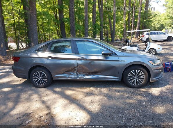 3VWCB7BU6KM268628 2019 VOLKSWAGEN JETTA Gray Widok wnętrza z tyłu