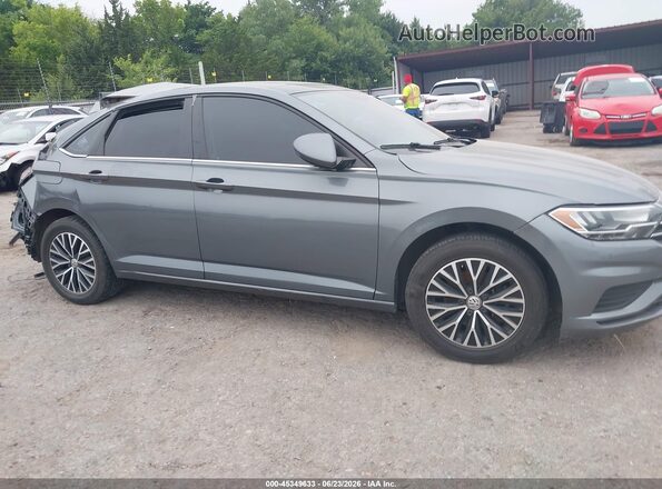 3VWCB7BU9KM202235 2019 VOLKSWAGEN JETTA Silver Widok wnętrza z tyłu