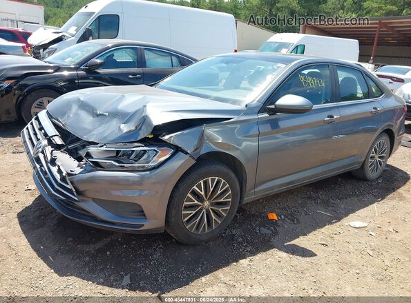 3VWCB7BUXLM027625 2020 VOLKSWAGEN JETTA Gray Vista tres cuartos delantera izquierda