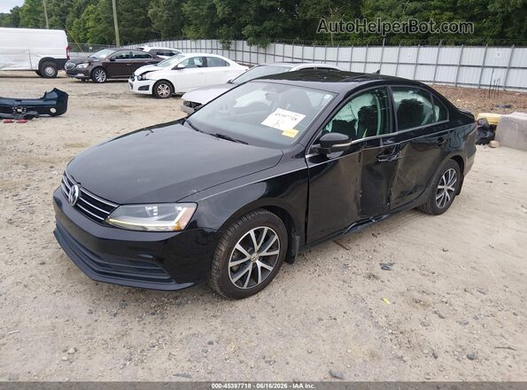 3VWDB7AJ0HM298910 2017 VOLKSWAGEN JETTA Black წინა მარცხენა ხედი სამი მეოთხედიდან