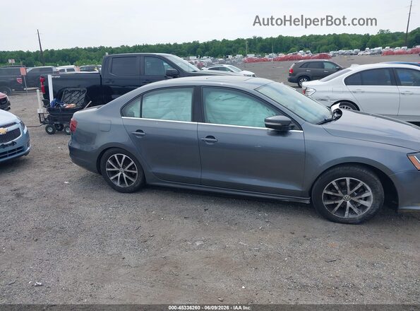 3VWDB7AJ3HM299016 2017 VOLKSWAGEN JETTA Gray Սալոնի հետևի տեսք