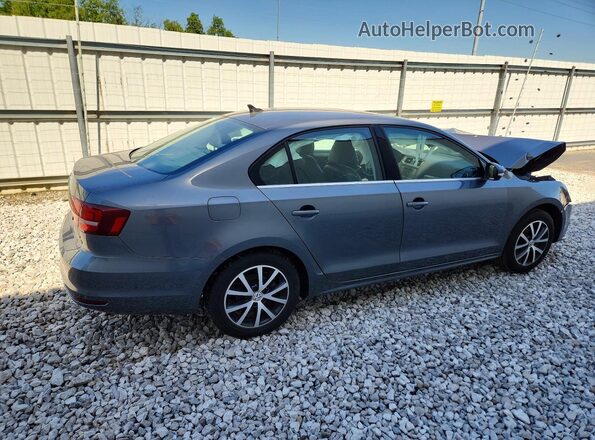 3VWDB7AJ3JM226587 2018 VOLKSWAGEN JETTA Gray 