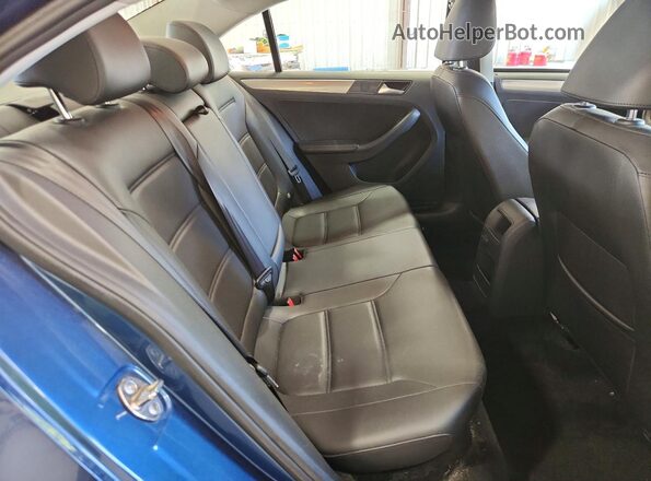 3VWDB7AJ3JM250145 2018 VOLKSWAGEN JETTA Blue Rear seats view