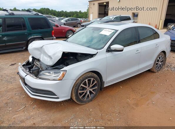 3VWDB7AJ4JM204386 2018 VOLKSWAGEN JETTA White Առջևի ձախ երեք քառորդ տեսարան