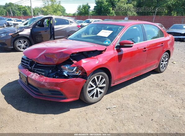 3VWDB7AJ4JM262224 2018 VOLKSWAGEN JETTA Red Vista tres cuartos delantera izquierda