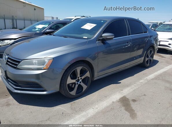 3VWDB7AJ6HM248089 2017 VOLKSWAGEN JETTA Gray Vista tres cuartos delantera izquierda