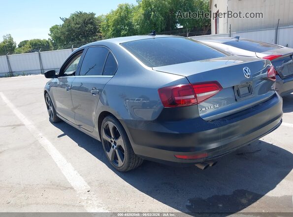 3VWDB7AJ6HM248089 2017 VOLKSWAGEN JETTA Gray Trasero izquierdo