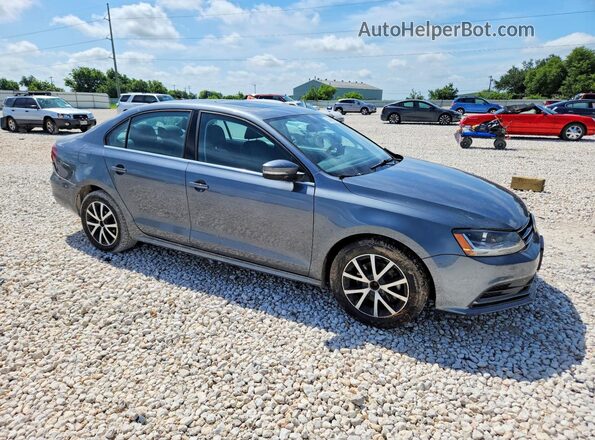 3VWDB7AJ6JM223053 2018 VOLKSWAGEN JETTA Серый Передняя правая четверть