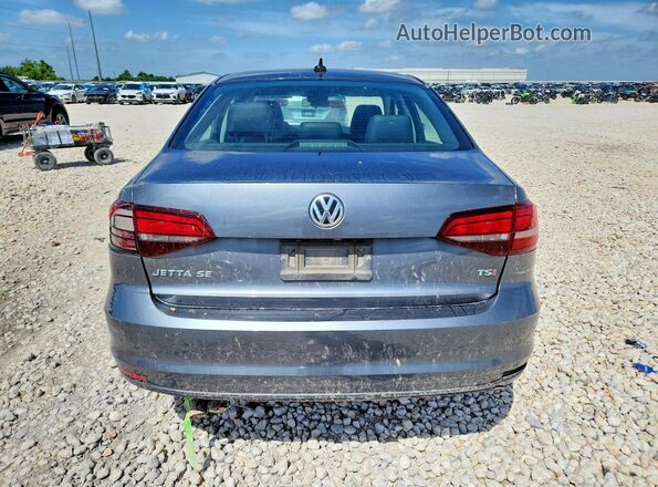 3VWDB7AJ6JM223053 2018 VOLKSWAGEN JETTA Серый Вид сзади