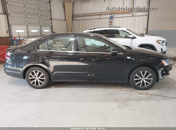 3VWDB7AJ6JM235896 2018 VOLKSWAGEN JETTA Black Rear interior view