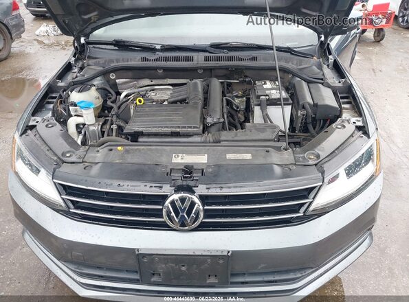 3VWDB7AJ8HM408716 2017 VOLKSWAGEN JETTA Gray Widok z tyłu