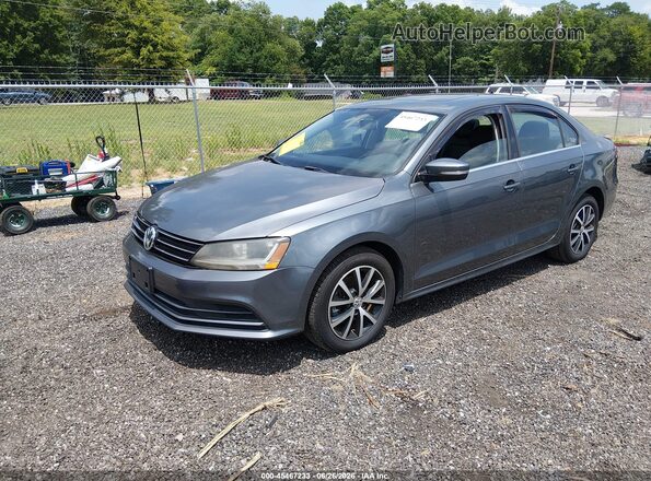 3VWDB7AJXJM263491 2018 VOLKSWAGEN JETTA Gray Առջևի ձախ երեք քառորդ տեսարան