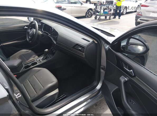 3VWE57BU4MM091306 2021 VOLKSWAGEN JETTA Gray Front interior view