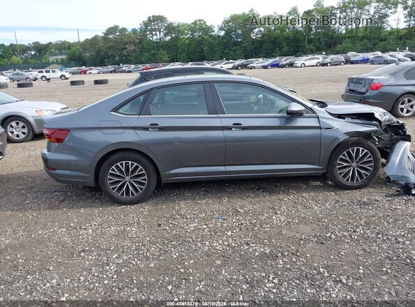 3VWE57BU6KM018435 2019 VOLKSWAGEN JETTA Серый Вид задней части салона