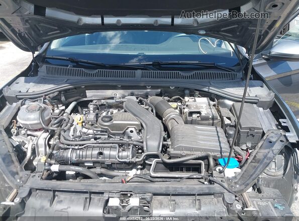 3VWEM7BU0RM042405 2024 VOLKSWAGEN JETTA Gray Rear view