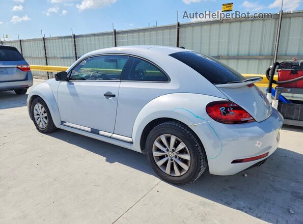 3VWF17AT1HM616708 2017 VOLKSWAGEN BEETLE Silver Trasero izquierdo