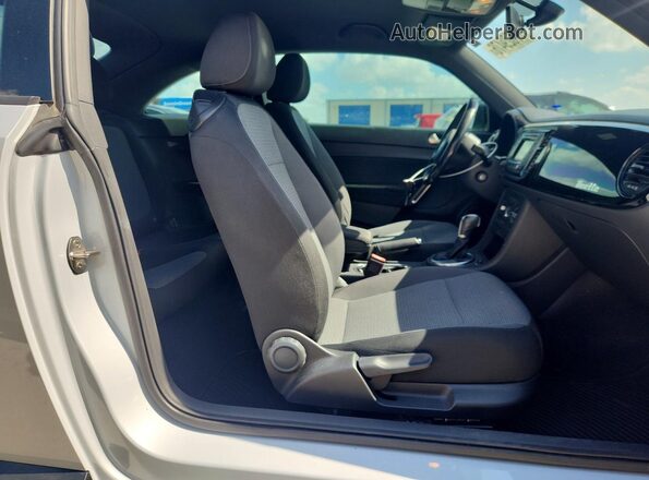 3VWF17AT1HM616708 2017 VOLKSWAGEN BEETLE Silver Vista de los asientos traseros
