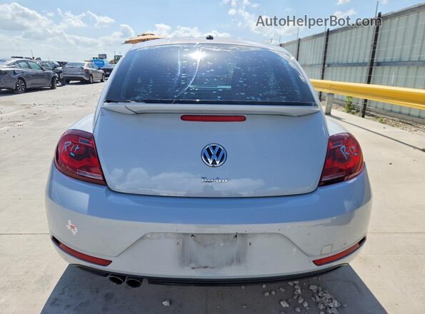 3VWF17AT1HM616708 2017 VOLKSWAGEN BEETLE Silver Vista trasera