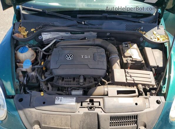 3VWF17AT7HM618625 2017 VOLKSWAGEN BEETLE Green Widok wnętrza z tyłu