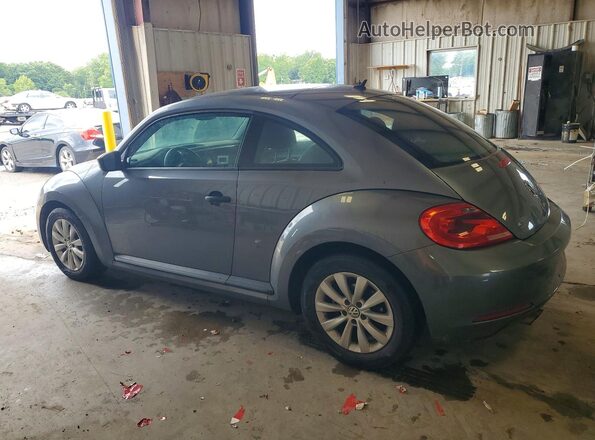 3VWF17AT8GM602187 2016 VOLKSWAGEN BEETLE Silver Trasero izquierdo