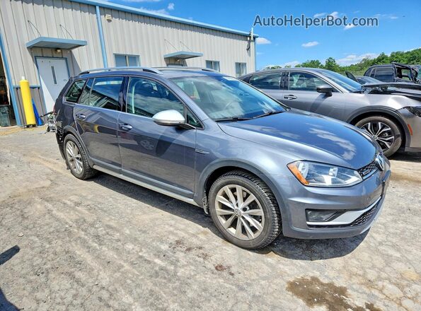 3VWH17AU2HM531829 2017 VOLKSWAGEN GOLF Gray Front right