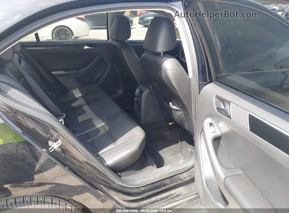 3VWL17AJ5GM260232 2016 VOLKSWAGEN JETTA Black Vista de la etiqueta del VIN