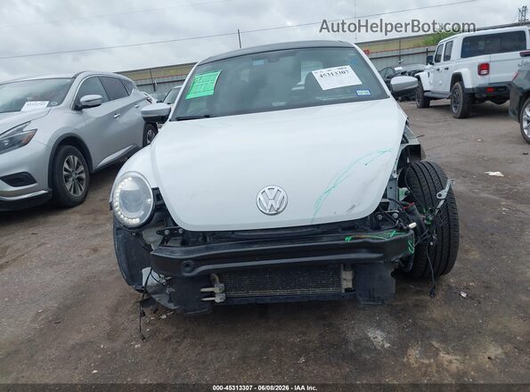 3VWS17AT4HM624932 2017 VOLKSWAGEN BEETLE White Vista interior trasera