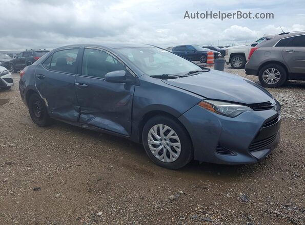 5YFBURHE1KP893323 2019 TOYOTA COROLLA Gray Вид спереду
