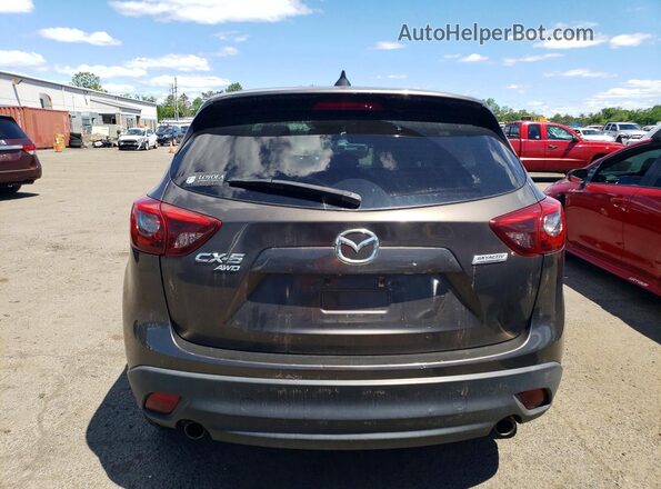 JM3KE4DY9G0773262 2016 MAZDA CX-5 Brown Front interior view