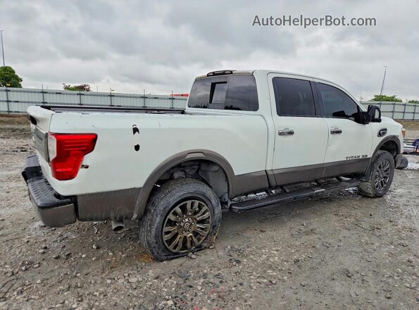 1N6BA1F2XGN511584 2016 NISSAN TITAN White Delantero derecho