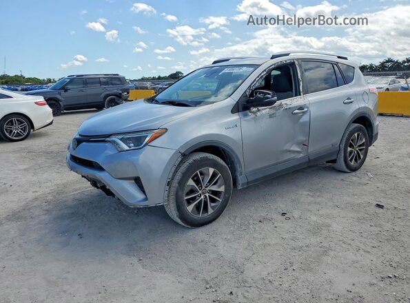 JTMRJREV5JD213856 2018 TOYOTA RAV4 Серебряный Задняя левая четверть