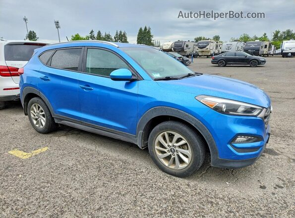 KM8J3CA4XGU228648 2016 HYUNDAI TUCSON Blue 