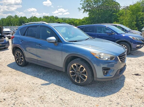 JM3KE4DY6G0670963 2016 MAZDA CX-5 Blue Front view